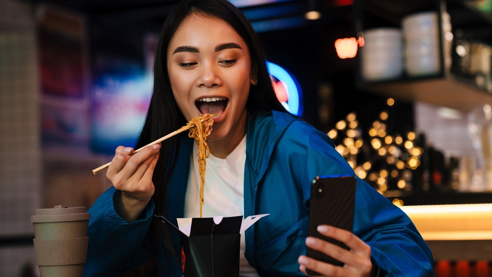 photo-of-asian-woman-eating-chinese-noodles-and-us-2021-08-28-03-02-40-utc