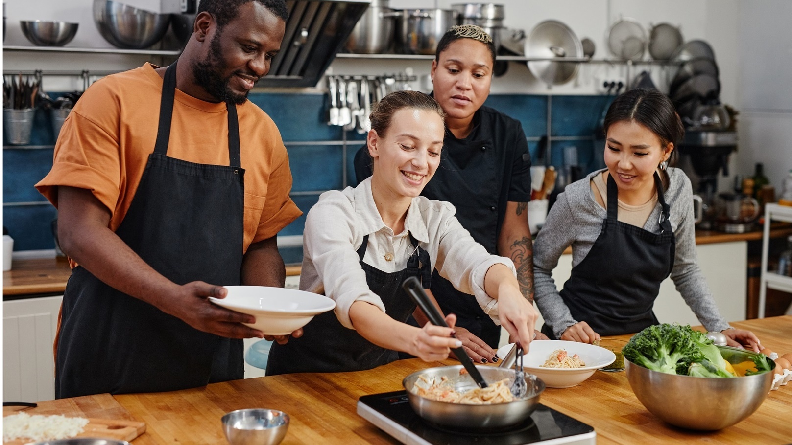people-cooking-pasta-in-workshop-2021-12-09-15-21-17-utc