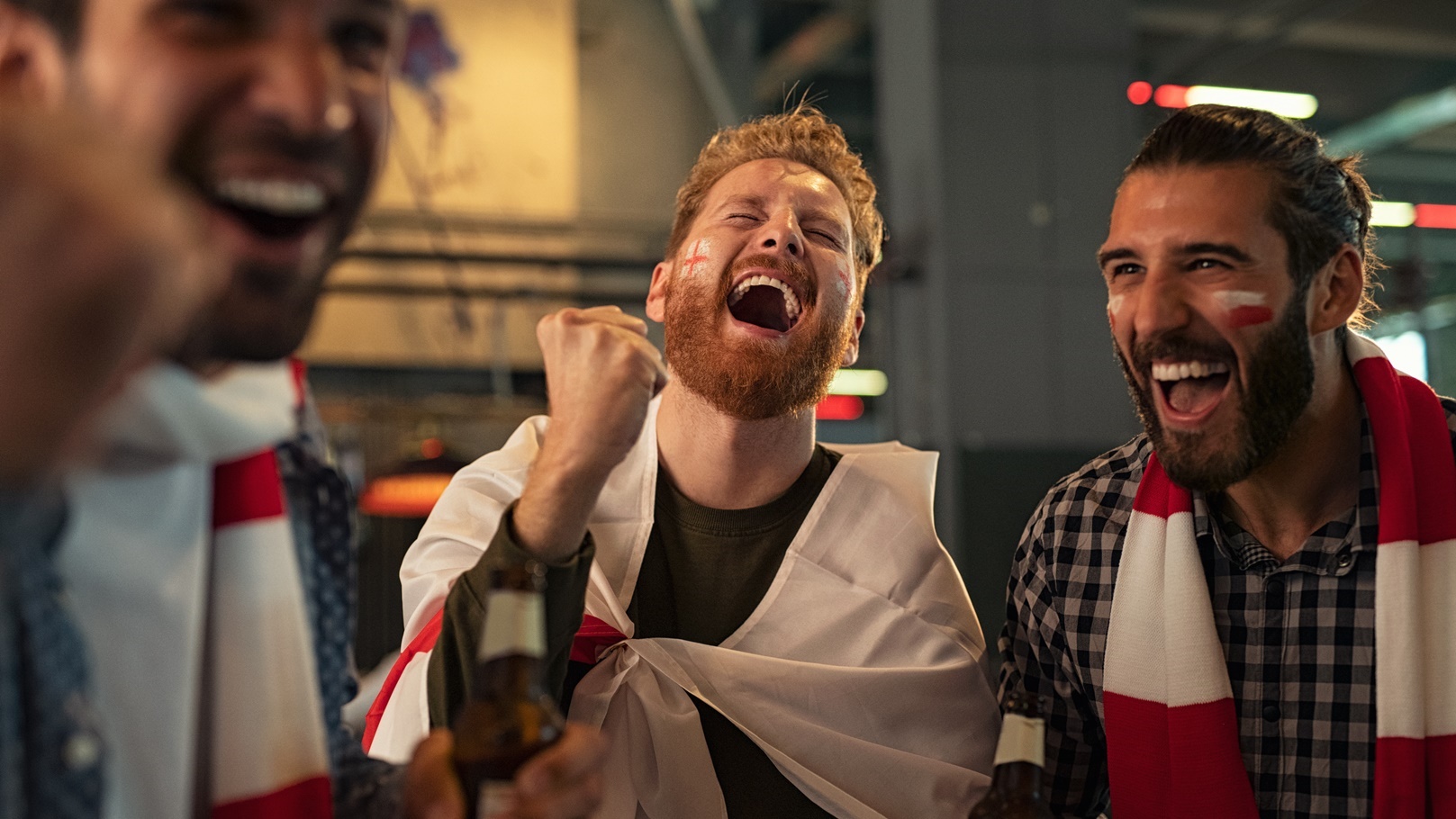 friends-celebrating-victory-in-bar-2021-08-27-09-32-59-utc