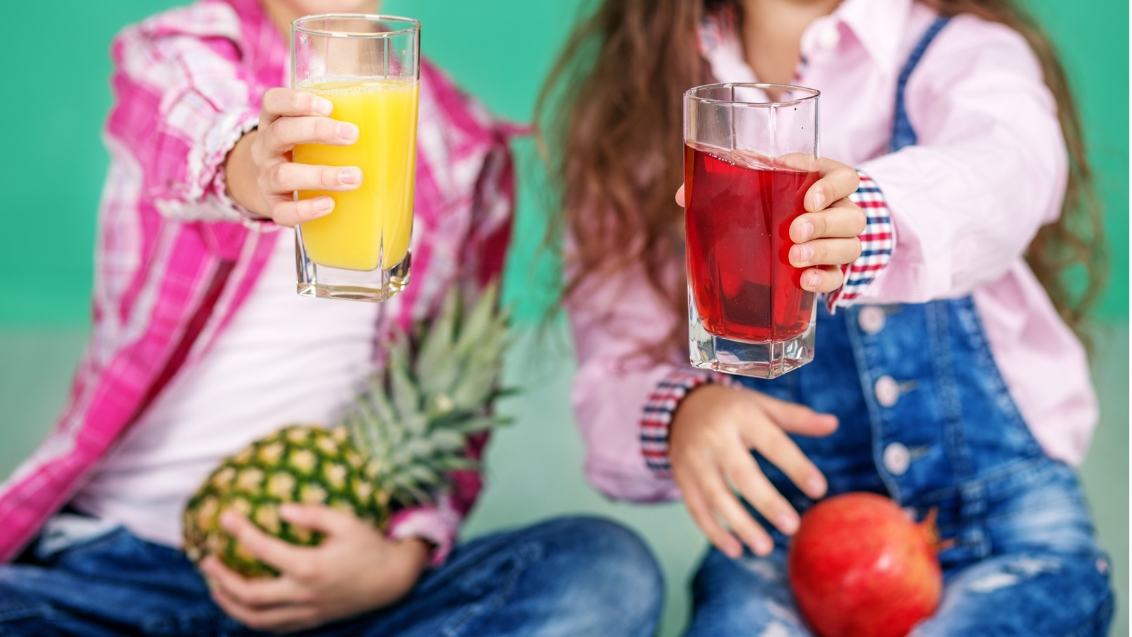 children-with-fruit-juice-and-pineapple-and-pomegr-2022-01-27-23-40-50-utc