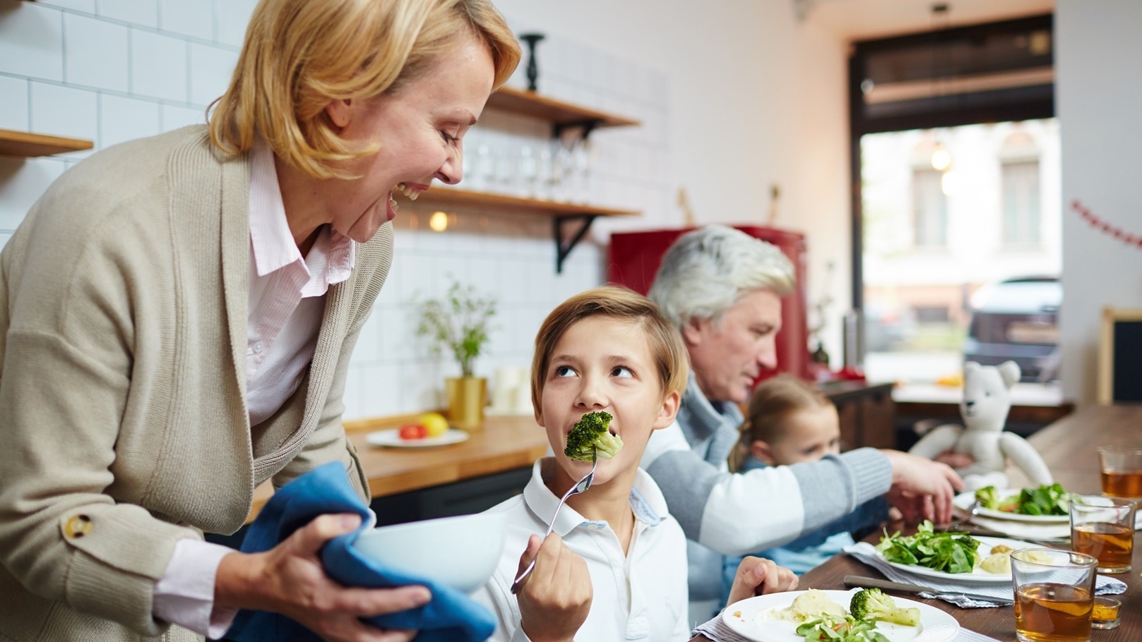 boy-eating-broccoli-2021-09-24-03-24-19-utc