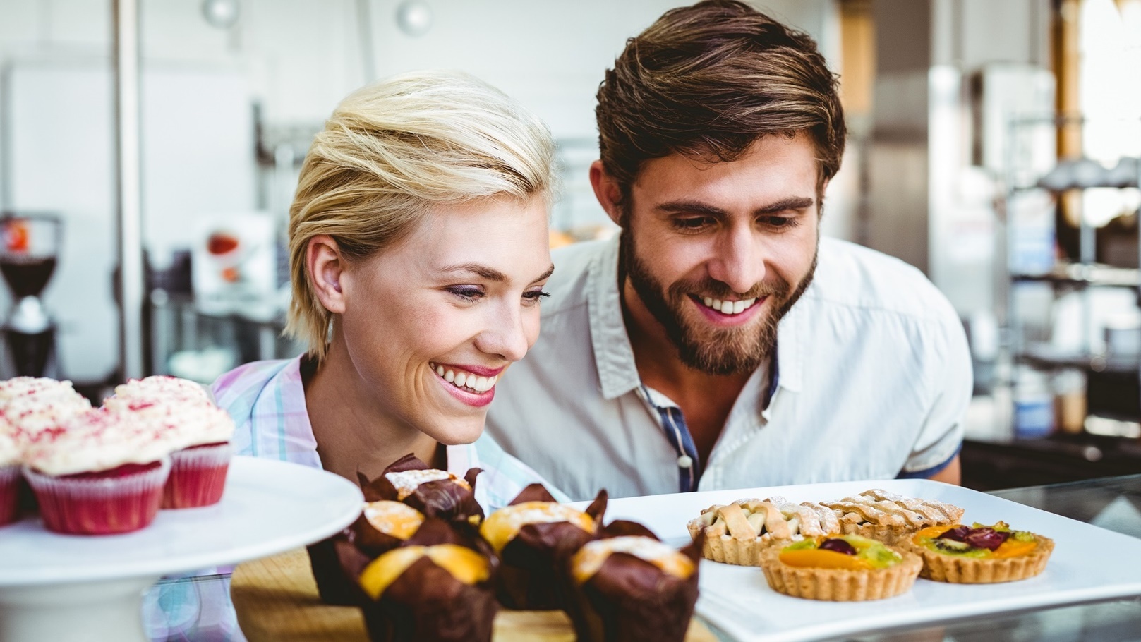 cute-couple-on-a-date-looking-at-cakes-at-the-bake-2021-08-28-16-09-50-utc