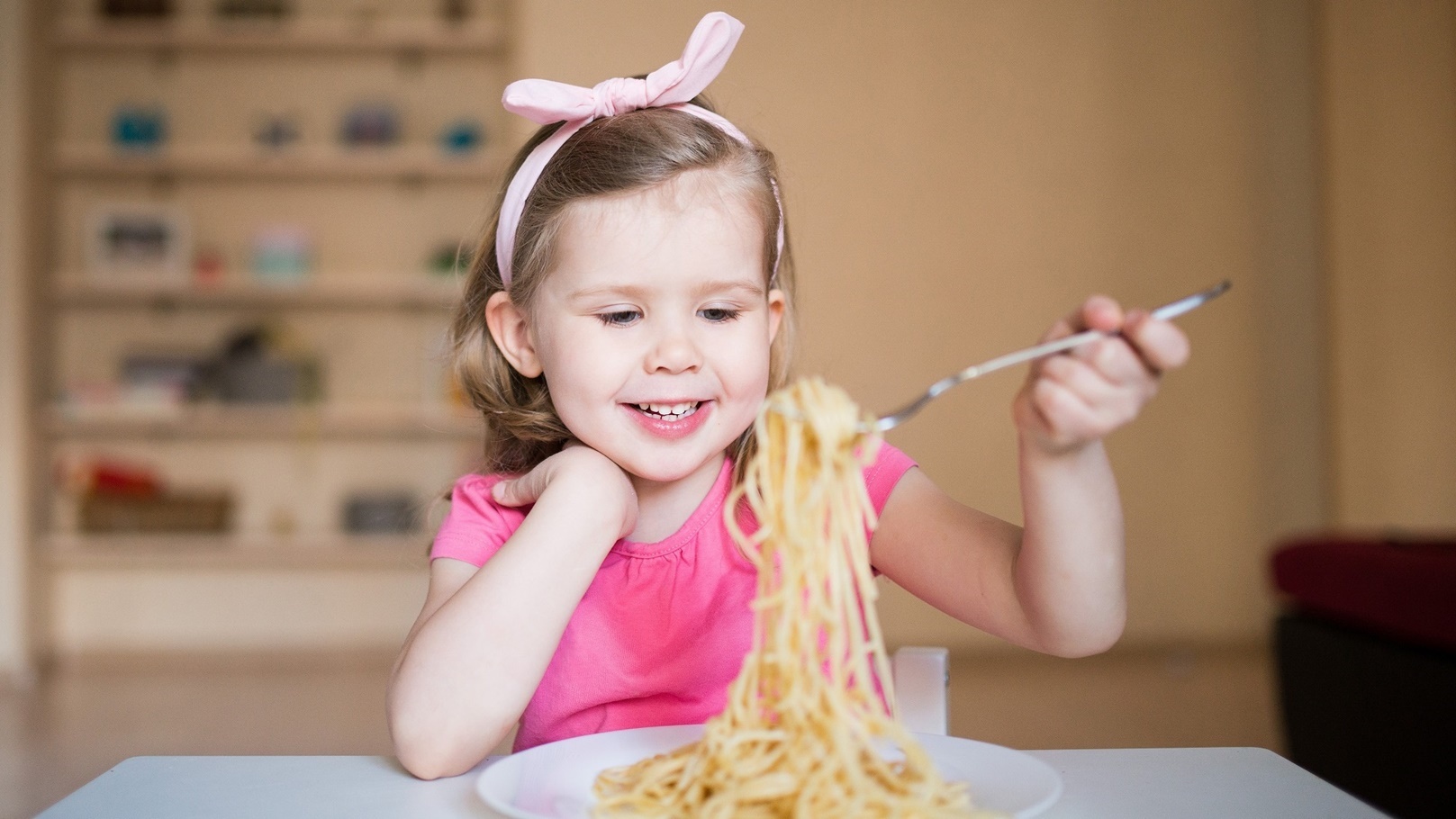 happy-girl-eating-pasta-2021-09-01-19-42-43-utc