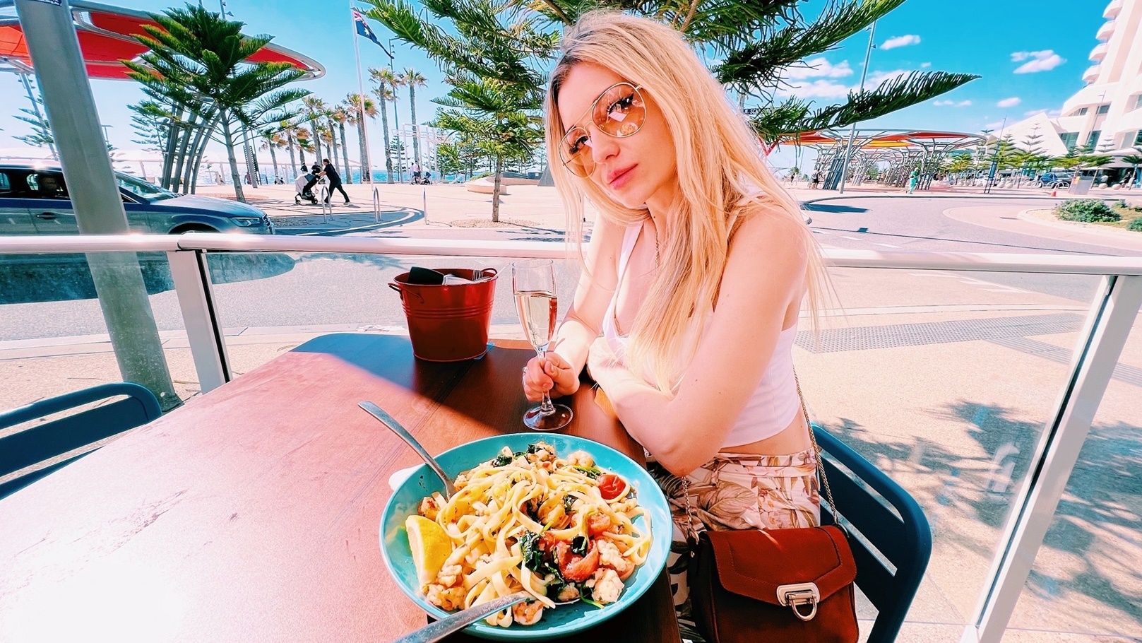 beautiful-blonde-girl-eating-seafood-pasta-at-the-2022-01-23-18-47-38-utc