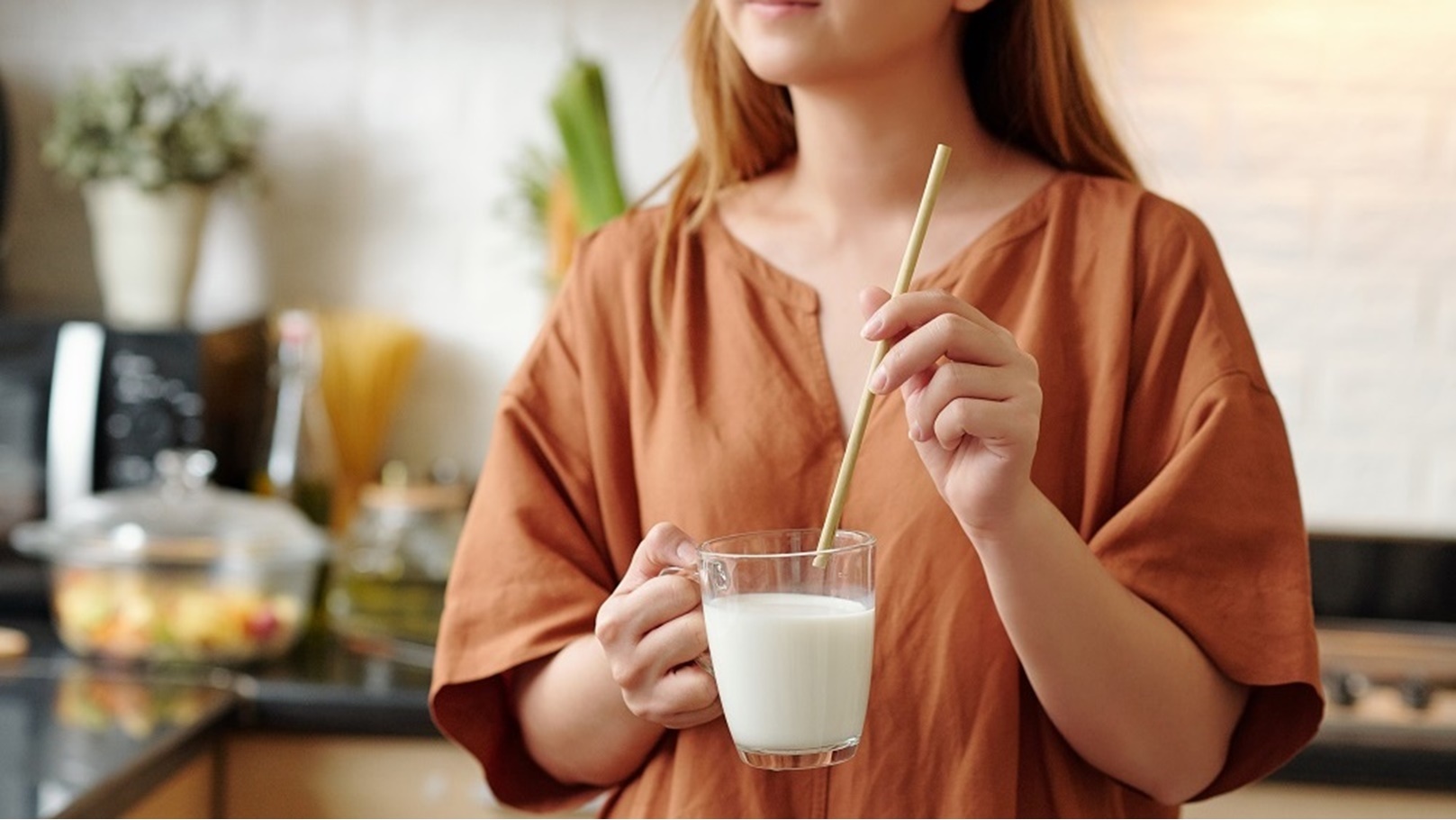 woman-drinking-almond-milk-2022-01-27-22-42-39-utc