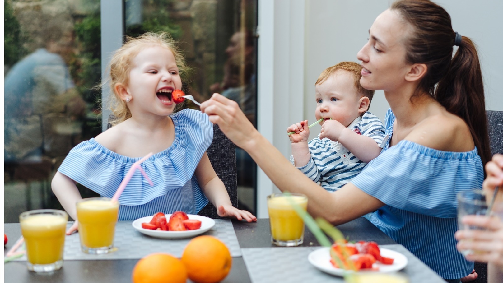 happy-family-fresh-fruit-breakfast-2022-03-30-20-23-39-utc