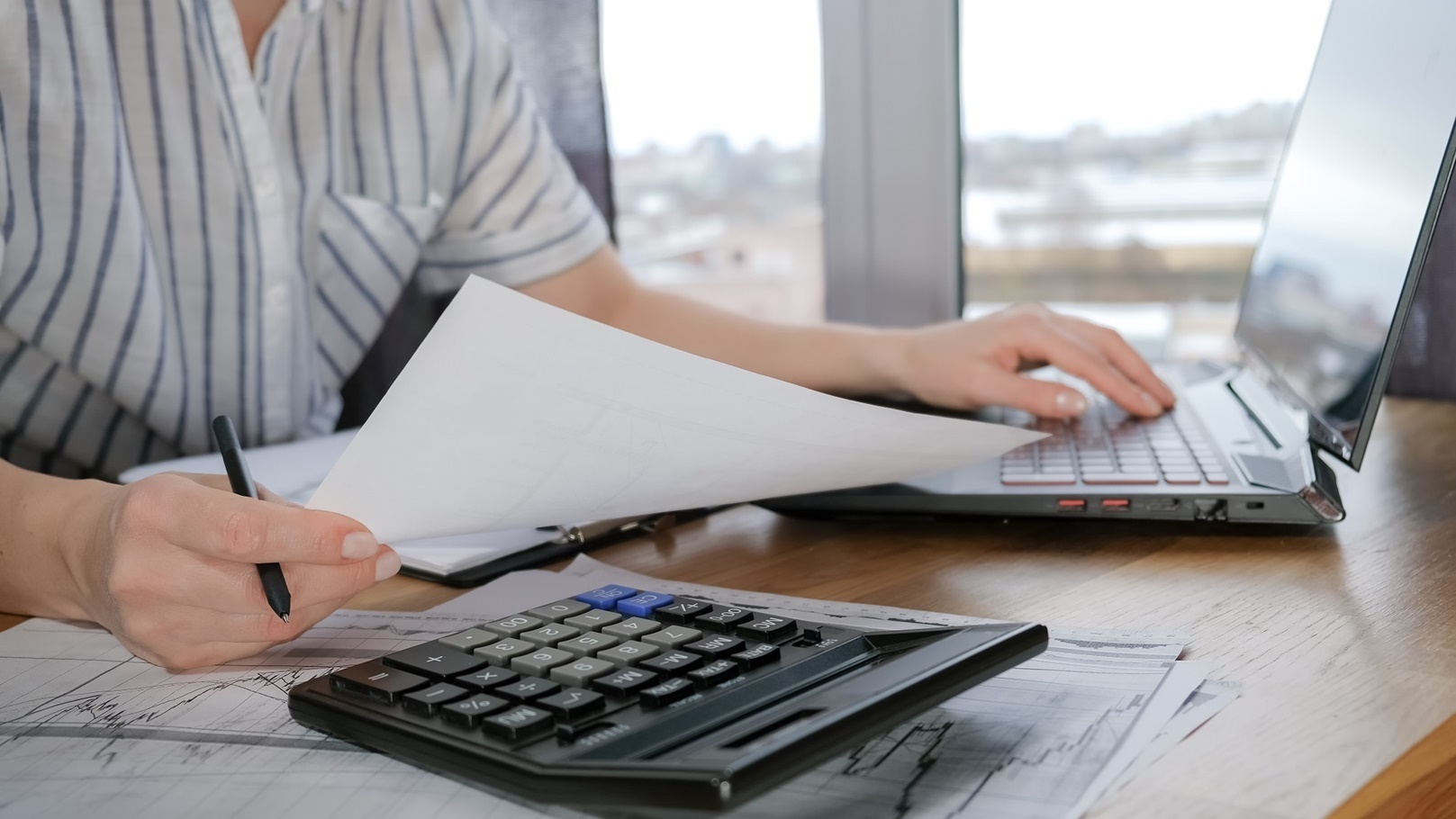 investments-young-woman-investor-buys-stocks-on-t-2022-02-15-23-23-48-utc