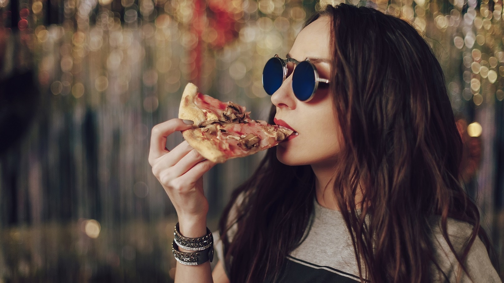 girl-eating-tasty-pizza-2021-08-26-15-55-08-utc