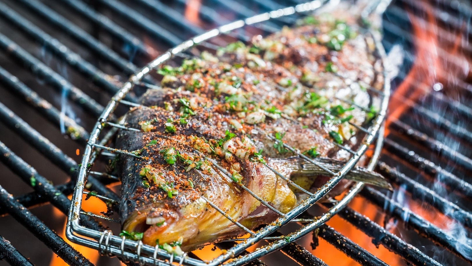 baked-fish-on-the-grill-with-fire-2022-04-08-23-28-54-utc