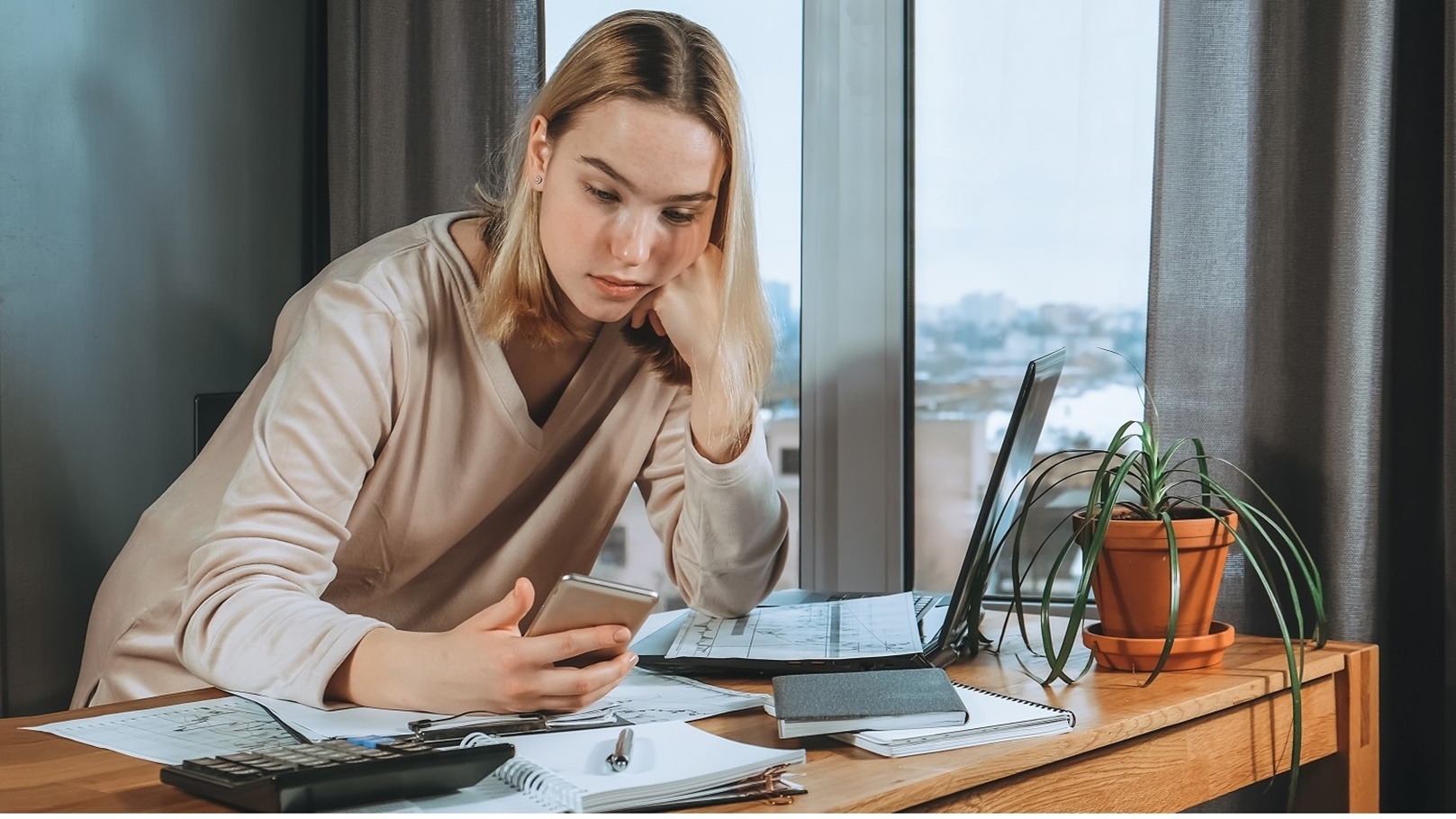 investments-young-woman-investor-buys-stocks-on-t-2022-01-12-05-19-44-utc (1)