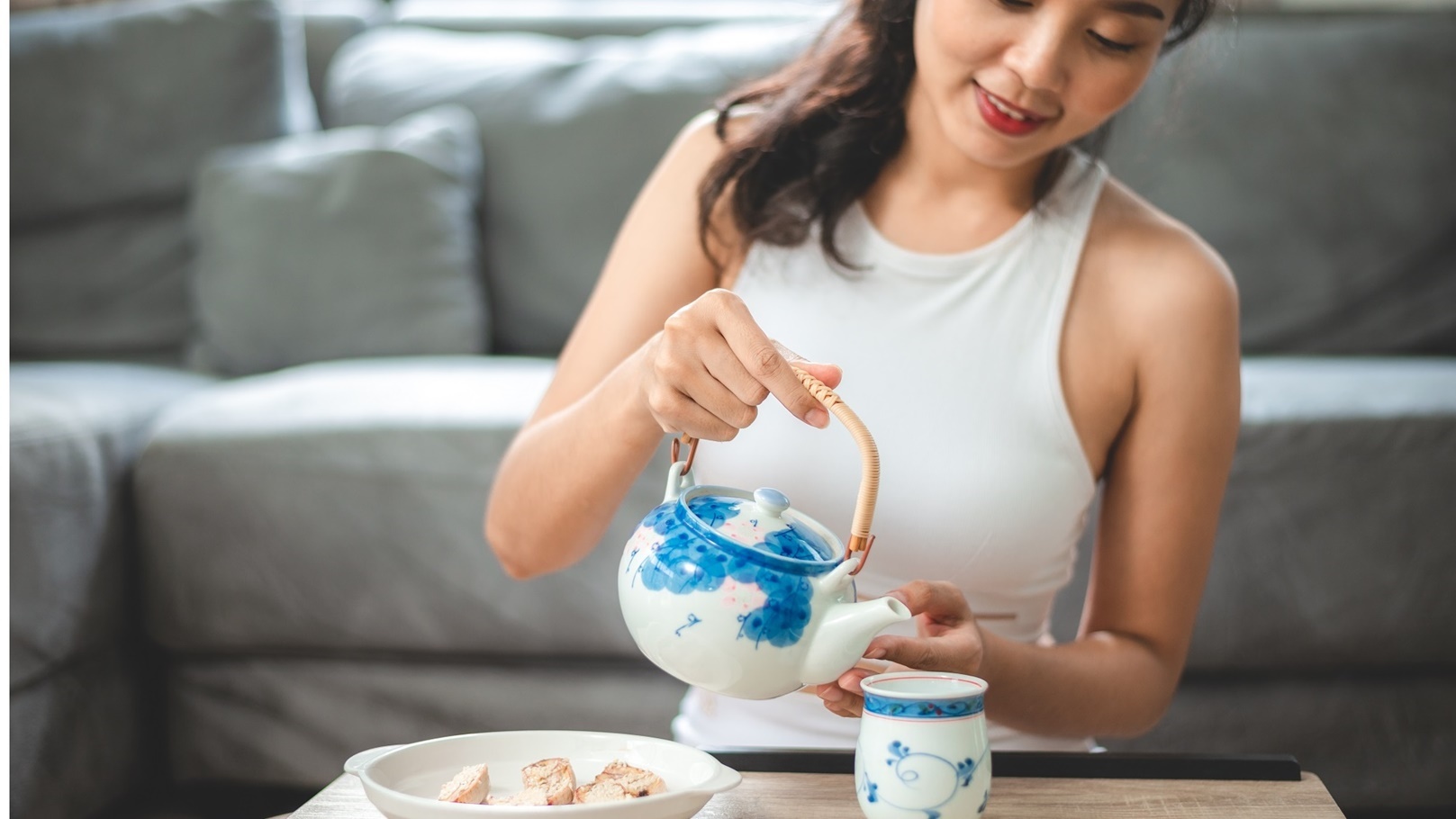 asian-woman-person-relaxing-with-hot-tea-to-drink-2022-01-18-23-59-58-utc (1)