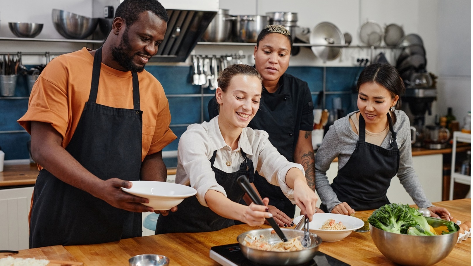 people-cooking-pasta-in-workshop-2021-12-09-15-21-17-utc