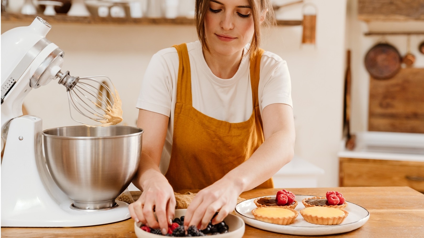 beautiful-concentrated-pastry-chef-woman-making-ta-2022-02-01-22-36-35-utc