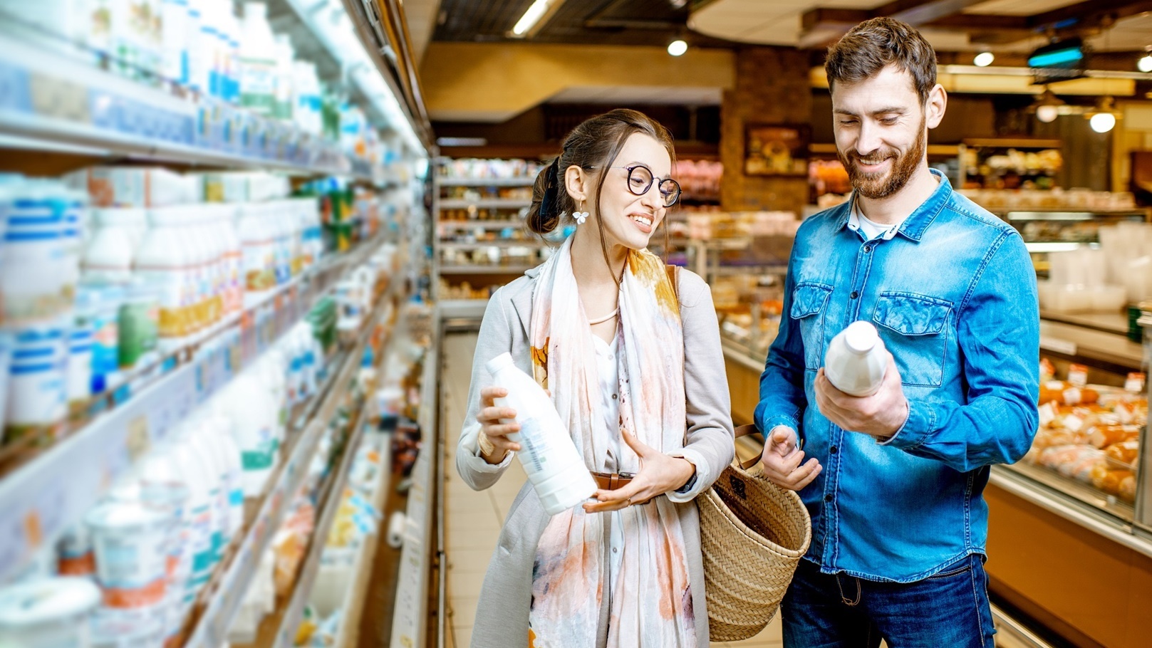 couple-buying-dairy-products-in-the-supermarket-2022-01-19-00-17-36-utc