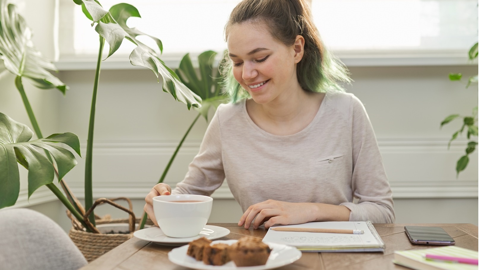 teen-girl-eating-cupcakes-drinking-tea-sitting-a-2022-01-13-23-30-29-utc (2)